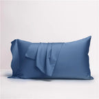 Slate blue Egyptian cotton pillow shams displayed with matching accent pillow, NESLLA BLUE GREY – L&B