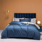 Modern bed styled with slate blue and silver gray reversible bedding, NESLLA BLUE GREY – L&B