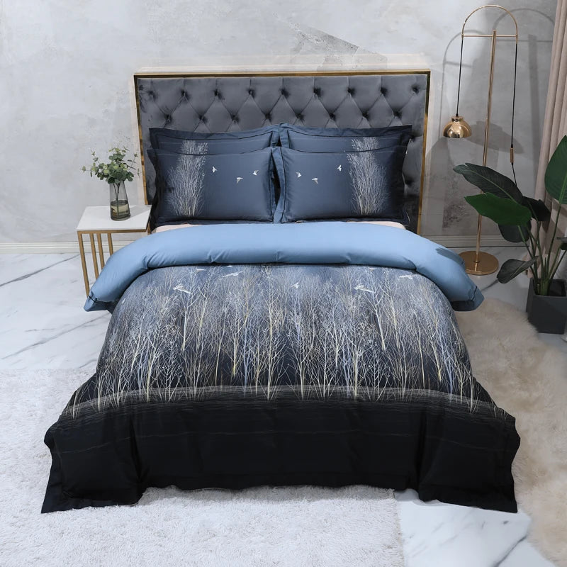 DARK FOREST navy woodland duvet cover set styled with coordinating beige bedding layers – L&B