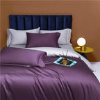 Purple and gray reversible bedding with a lustrous duvet cover and coordinated solid-color pillows – NESLLA PURPLE GREY – L&B