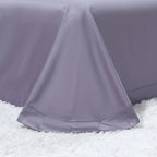 Coordinating solid gray flat sheet with softly draped edges for the emerald green floral bedding set – L&B