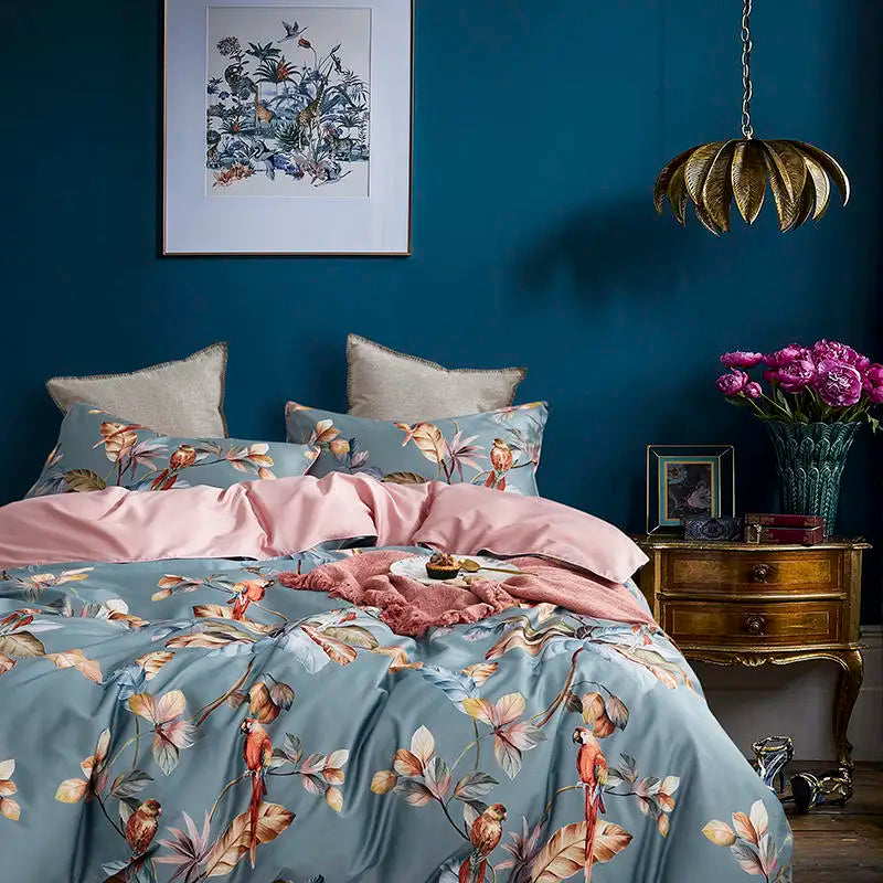 LIVELIC parrot botanical bedding styled against a deep teal wall with blush pink accents – L&B