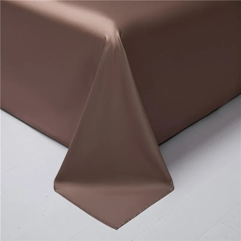 Deep brown reverse side of the terracotta duvet cover displayed in fluid Egyptian cotton fabric – NESLLA ORANGE BROWN – L&B