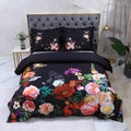 Black floral duvet cover set with vivid oversized botanical blooms in pink, red, blue and orange – L&B