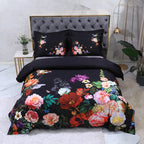 Black floral duvet cover set with vivid oversized botanical blooms in pink, red, blue and orange – L&B