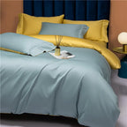 Blue and yellow reversible bedding with a smooth Egyptian cotton duvet cover and layered pillows – NESLLA SKY-BLUE YELLOW – L&B