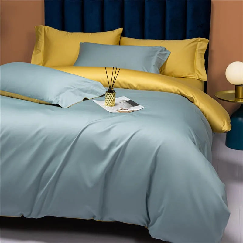Blue and yellow reversible bedding with a smooth Egyptian cotton duvet cover and layered pillows – NESLLA SKY-BLUE YELLOW – L&B