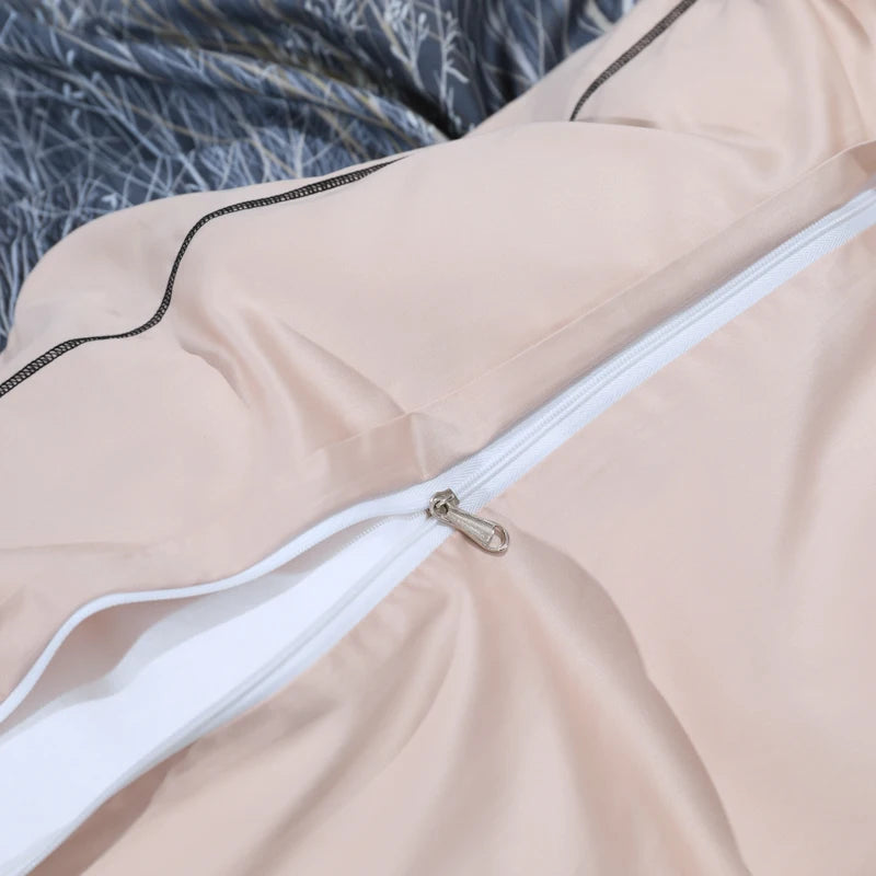 Hidden zipper closure detail on the coordinating warm beige reverse of the navy forest duvet cover – L&B