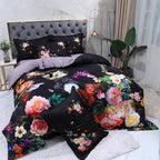 Black botanical bedding with oversized multicolor flowers styled in a modern bedroom – L&B