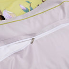 Hidden zipper closure with yellow piping and a coordinating lilac-gray duvet cover reverse – L&B