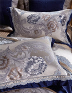 Close-up of champagne floral embroidery on a luxury pillow sham, STOPIAK – L&B