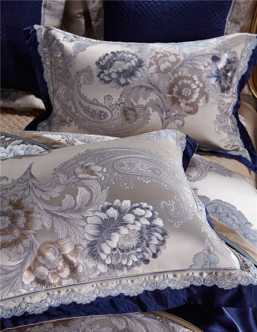 Close-up of champagne floral embroidery on a luxury pillow sham, STOPIAK – L&B
