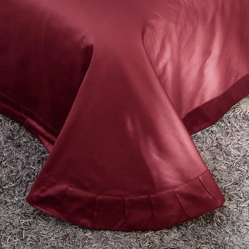 Coordinating solid burgundy flat sheet with a smooth tailored hem, ZUTAPERA – L&B