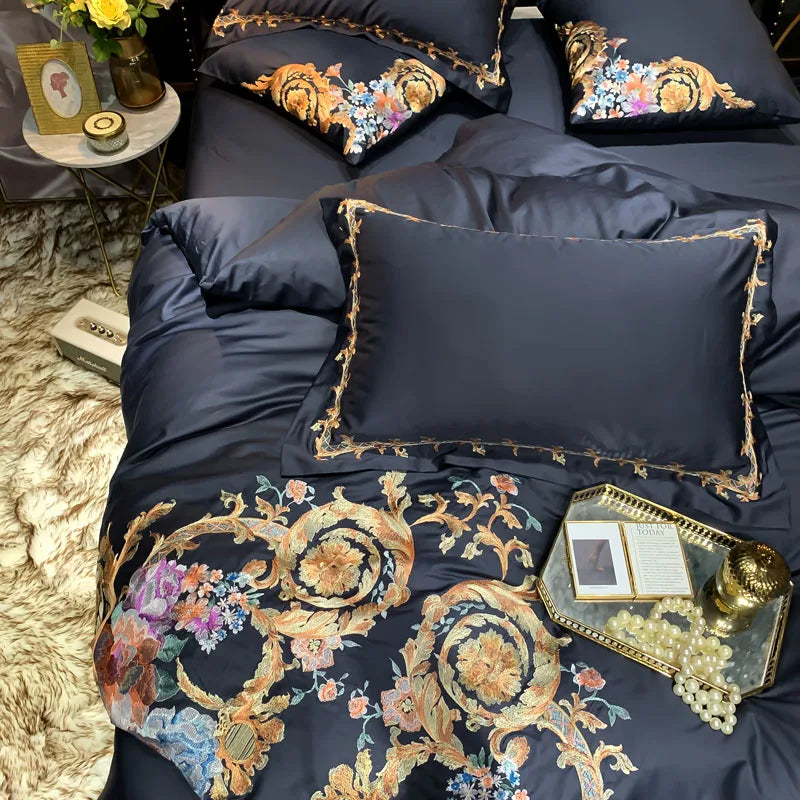 Black pillow sham with ornate gold and colorful floral embroidery, PERIK – L&B
