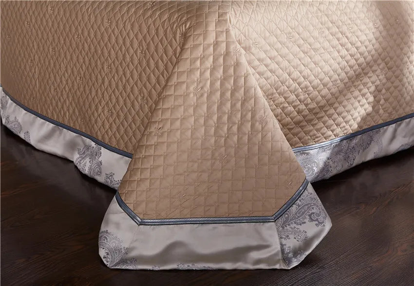 Champagne thick bed spread with a decorative embroidered border and tailored drape, STOPIAK – L&B