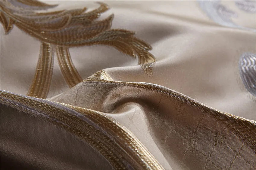 Silk and Egyptian cotton bedding close-up with sculpted gold trim and embroidery, SPECTO – L&B