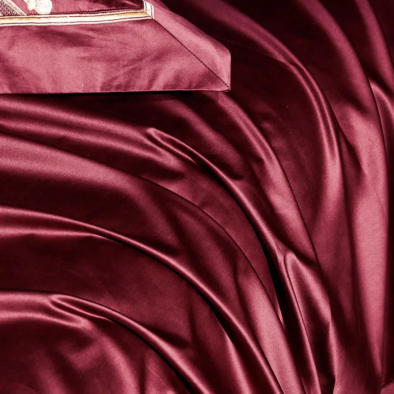 1000TC Egyptian cotton close-up showing a rich burgundy sheen and fluid drape, ZUTAPERA – L&B