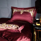 Burgundy pillow sham with ornate gold embroidered border and tailored flange, ZUTAPERA – L&B