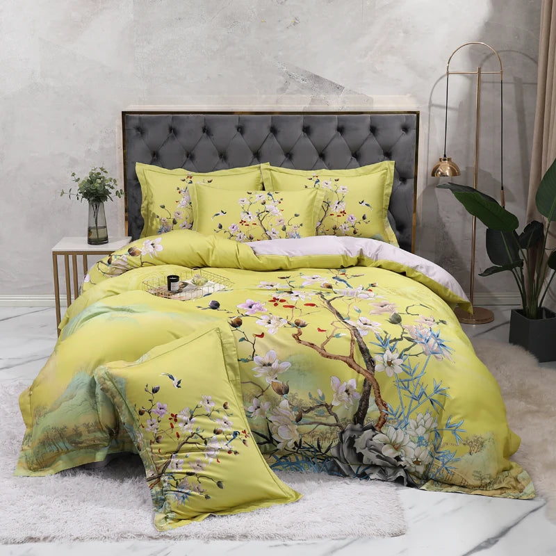 Yellow botanical bedding with a flowering tree design and coordinating floral pillow shams – L&B