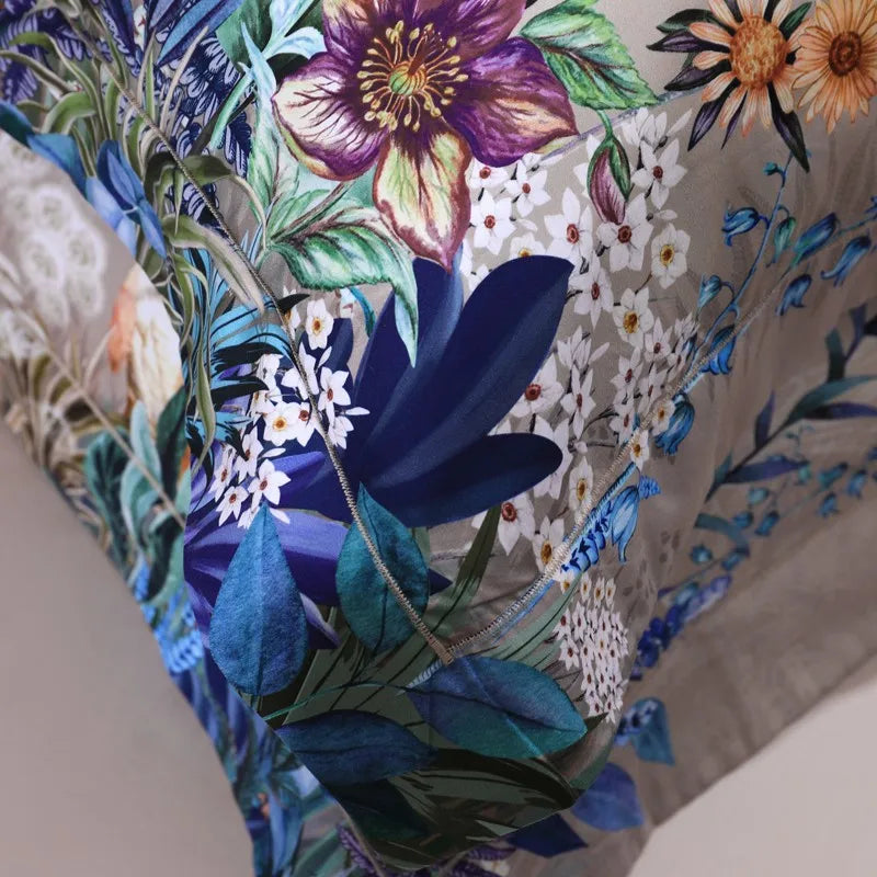 Close-up of a blue peacock surrounded by vivid wildflowers on the FLIFLOWERS duvet cover – L&B