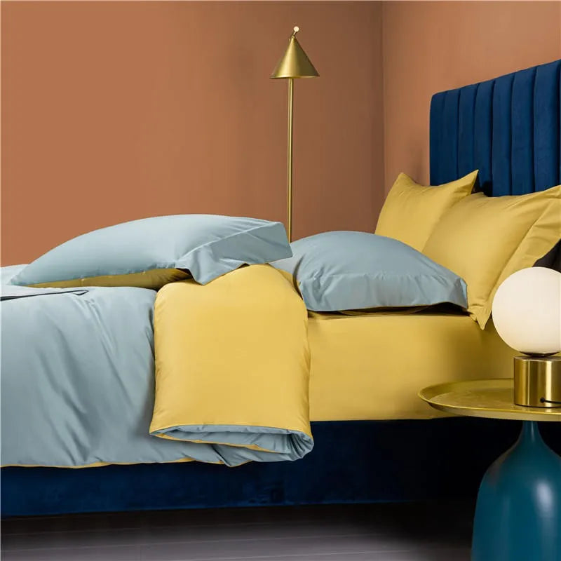 Sky blue Egyptian cotton bedding layered with yellow pillows for a bright modern bedroom – NESLLA SKY-BLUE YELLOW – L&B
