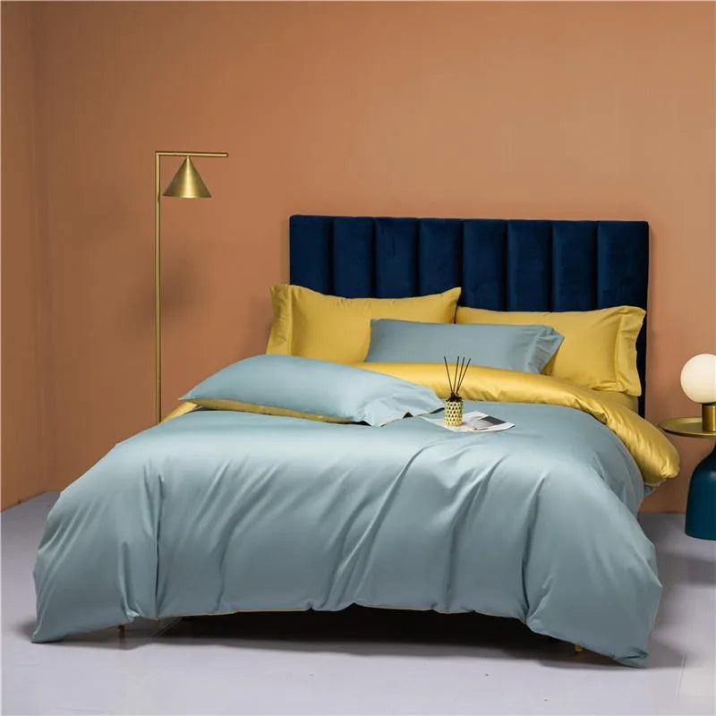 Sky blue bedding set styled with sunny yellow pillows and a navy upholstered headboard – NESLLA SKY-BLUE YELLOW – L&B
