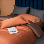 Reversible terracotta duvet cover with coordinating brown pillows and a warm modern color palette – NESLLA ORANGE BROWN – L&B