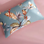 Dusty blue tropical parrot pillow sham with coral flowers and painterly botanical branches – L&B