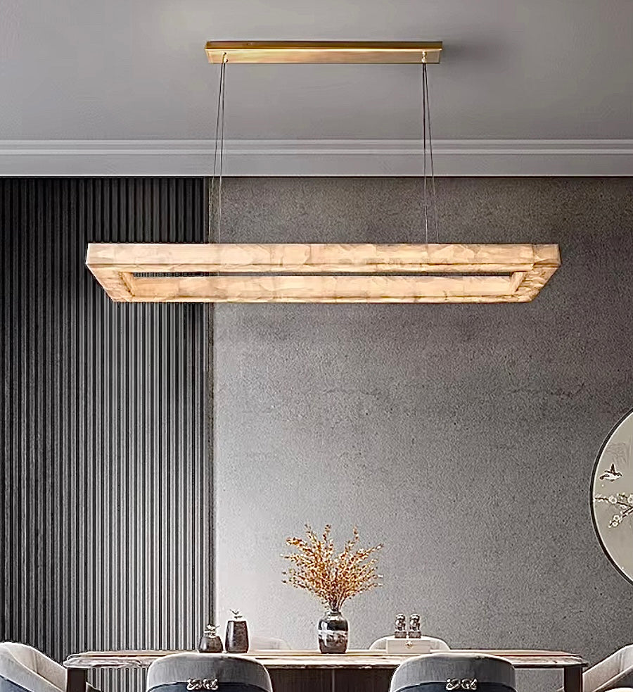 Illuminated Alabaster Linear Chandelier Installed in Modern Gray Dining Room - L&B