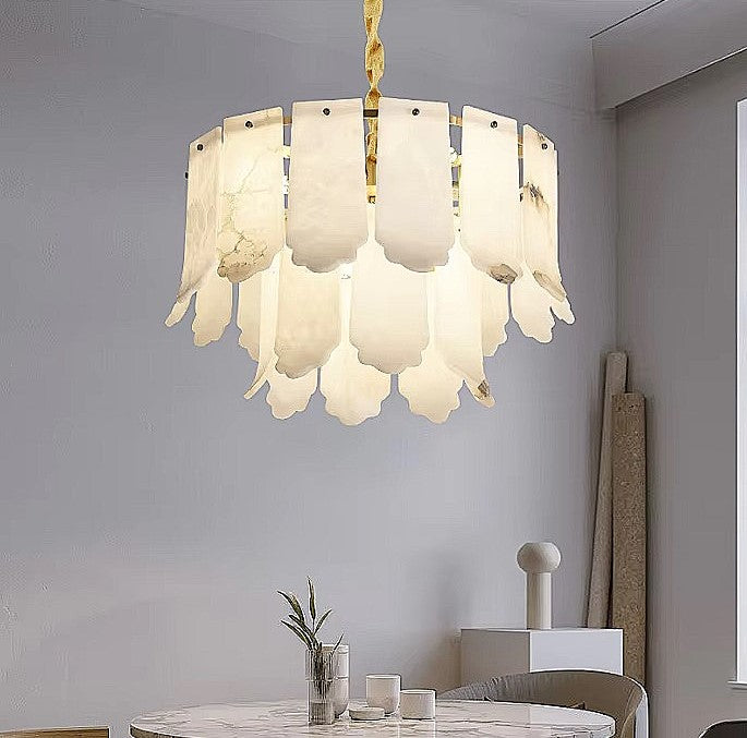 2-tier alabaster dining room chandelier above a round table in a modern minimalist interior - L&B