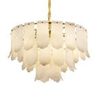 Modern 3-tier alabaster chandelier in a contemporary interior with a warm ambient glow - L&B