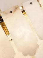 Close-up of natural alabaster panels on a luxury 3-tier chandelier - L&B
