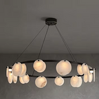 Modern alabaster disc chandelier with a black circular frame for a living room or foyer - L&B