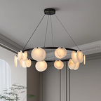 Organic alabaster disc chandelier in a quiet luxury living room interior - L&B