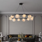 Alabaster disc ring chandelier in a contemporary dining room with warm ambient lighting - L&B