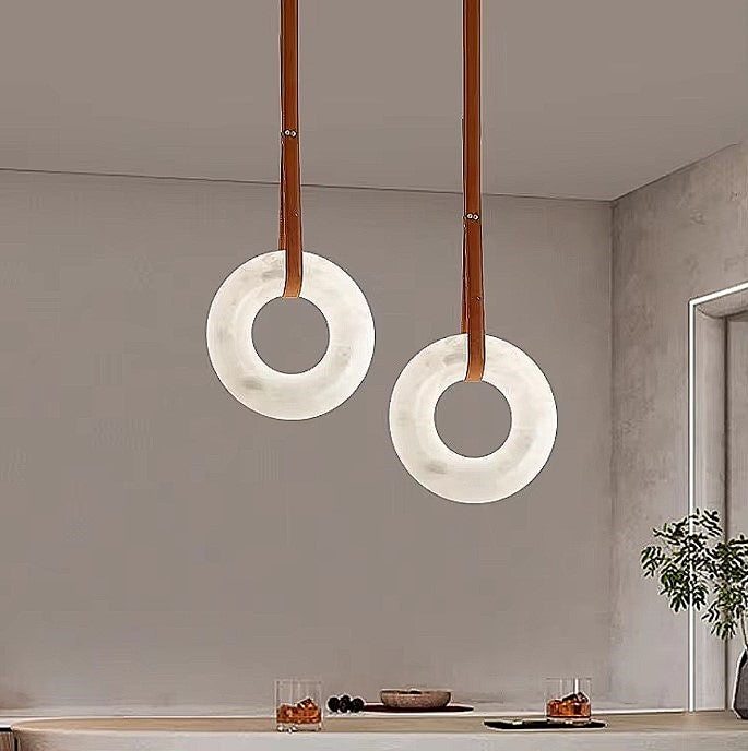 Modern alabaster pendant lights for kitchen island lighting with circular stone shades and leather suspension - L&B