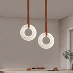 Modern alabaster pendant lights for kitchen island lighting with circular stone shades and leather suspension - L&B