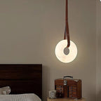 Alabaster bedroom pendant light for bedside lighting with a natural stone ring and warm illumination - L&B