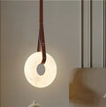 Alabaster ring pendant light for bedroom and bedside lighting with a warm natural stone glow - L&B