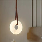 Alabaster ring pendant light for bedroom and bedside lighting with a warm natural stone glow - L&B