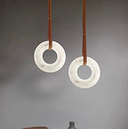 Alabaster ring pendant lights for kitchen island and dining room spaces with a modern minimalist design - L&B