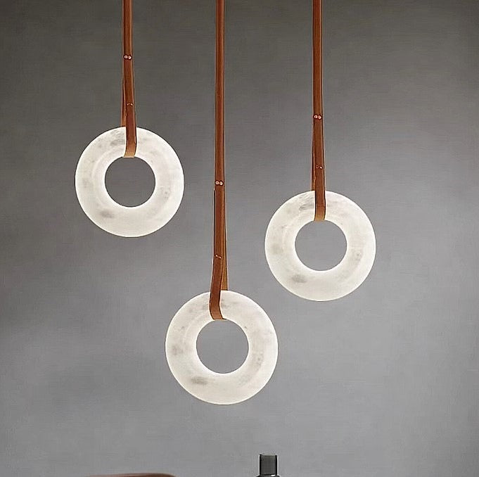 Alabaster ring pendant lights for kitchen island and dining room lighting in a three-light arrangement - L&B