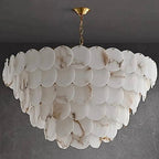 Natural alabaster disc chandelier with cascading round panels and a brass chain shown unlit - L&B