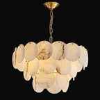 Modern alabaster disc chandelier with gold frame and layered natural stone lighting for contemporary interiors