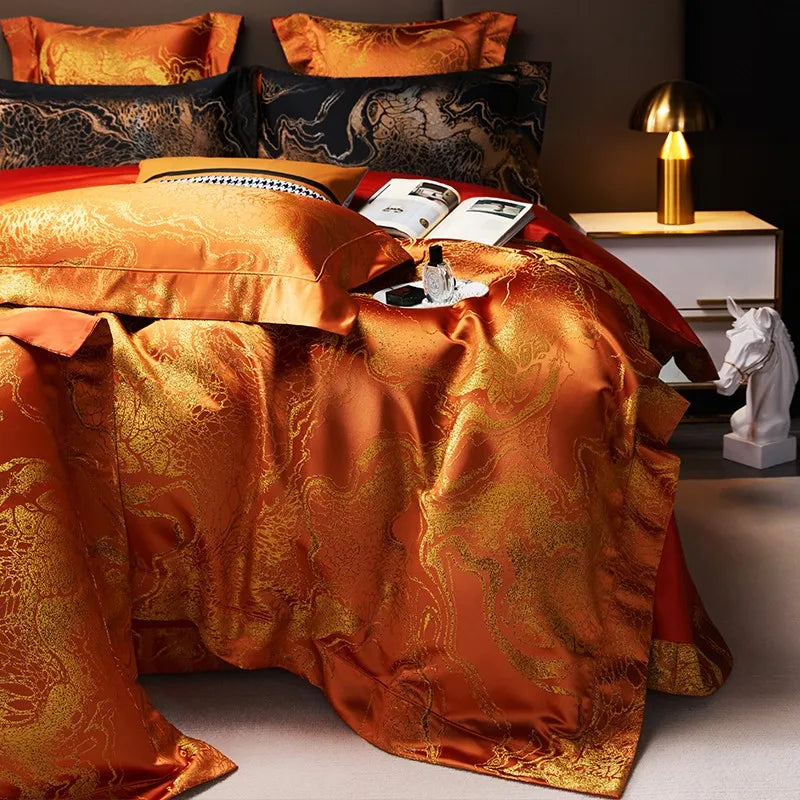 Rust orange jacquard duvet cover draped across a luxury bed with ornate woven detailing and coordinating pillow shams – L&B