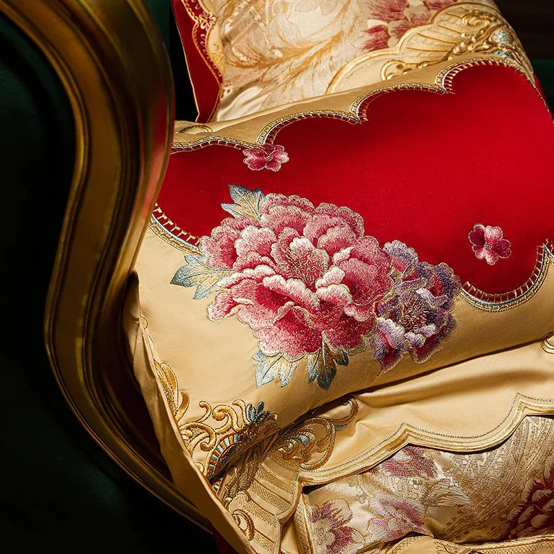 Red floral pillow sham with embroidered peonies, gold jacquard vines, and an ornate scalloped border – L&B