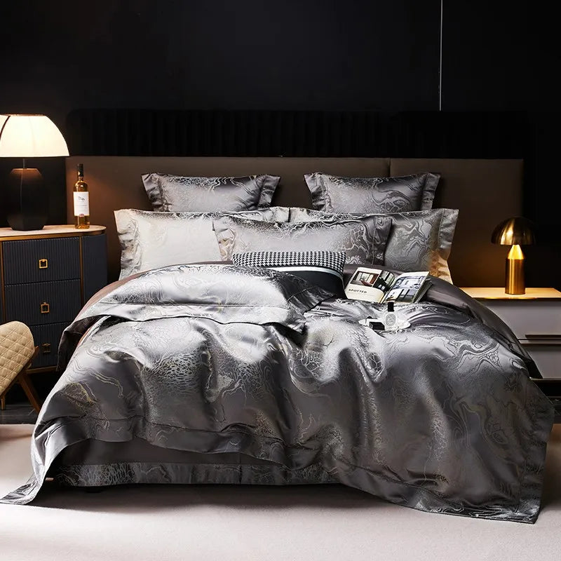 Charcoal gray jacquard duvet cover set with platinum threadwork, layered shams, and a rich metallic finish – L&B