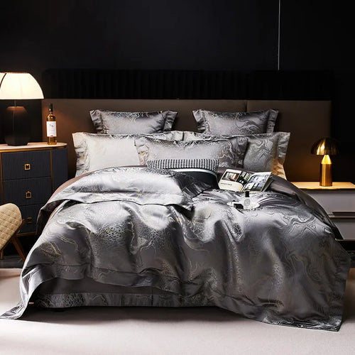 Charcoal gray jacquard duvet cover set with platinum threadwork, layered shams, and a rich metallic finish – L&B