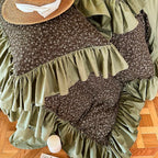 Ditsy floral cotton duvet cover with solid olive green ruffle borders, overhead view of MOSSBELLE – L&B