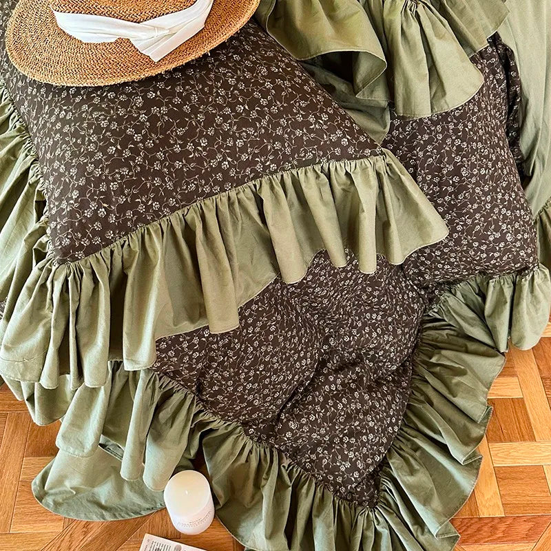 Ditsy floral cotton duvet cover with solid olive green ruffle borders, overhead view of MOSSBELLE – L&B